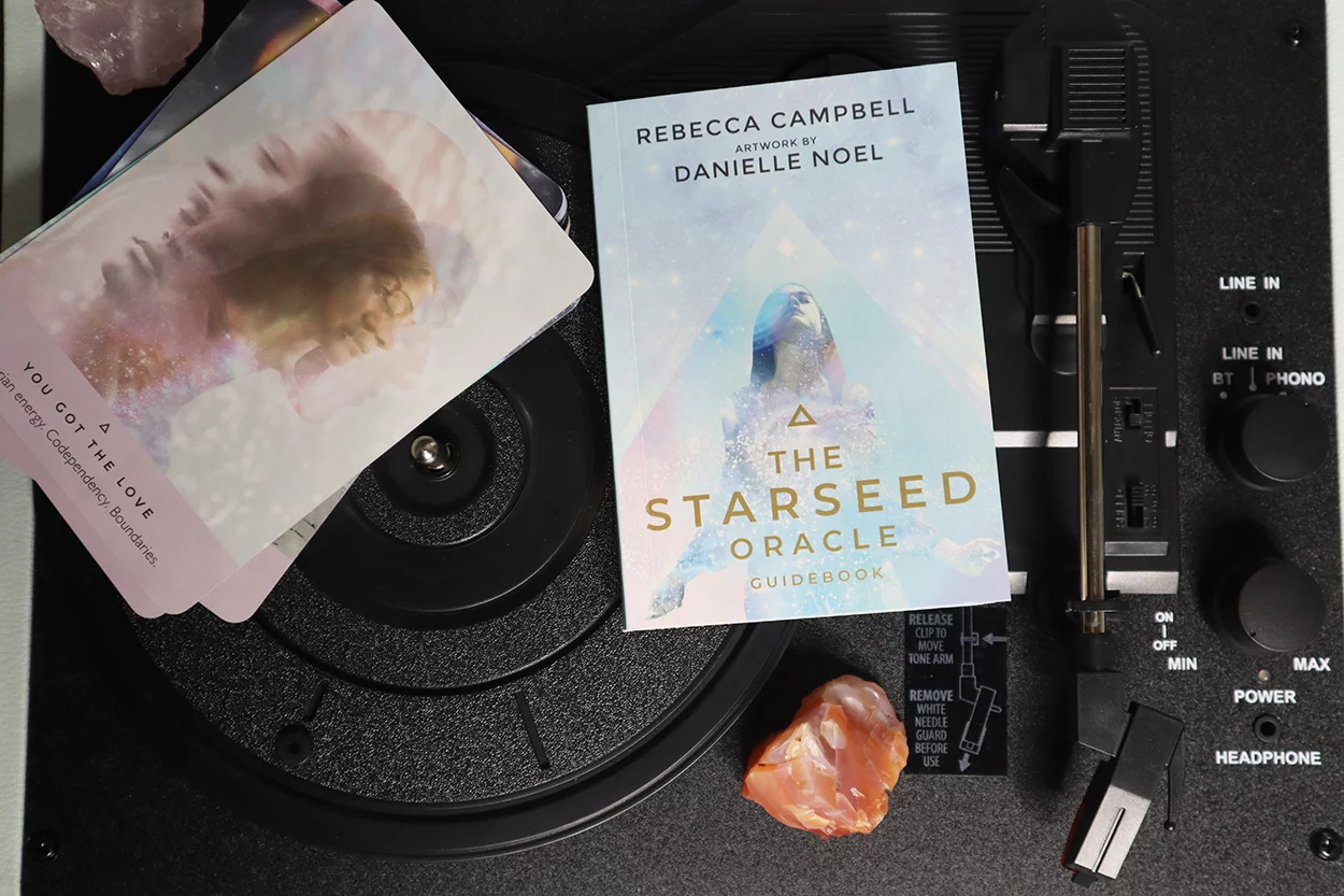 the starseed oracle deck guidebook with the deck of oracle cards