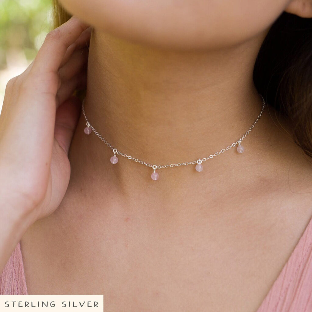 Rose quartz necklace on a women and sterling silver chain